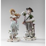 PAIR OF PORCELAIN FIGURES, RUSSIA PROBABLY 20TH CENTURY polychrome, depicting gardener and flower