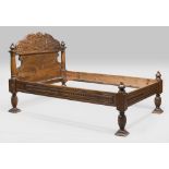 FINE BED IN WALNUT, PROBABLY EMILIA ELEMENTS OF THE 18TH CENTURY

carved with animals and family