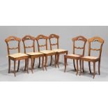 SIX CHAIRS IN WALNUT, LATE 19TH CENTURY pierced backrest. Seat in straw. Size cm. 94 x 45 x 35.