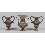 THREE VASES IN SILVER PLATE, ELEMENTS OF THE 18TH CENTURY

embossed with leaves. Some parts from