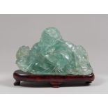 SCULPTURE IN FLUORITE, CHINA, 20TH CENTURY depicting Budai portrayed in fine classical