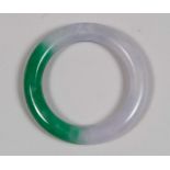 BRACELET IN JADE, CHINA, FIRST HALF 20TH CENTURY rounded with linear profile. Internal and