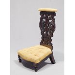 KNEELING STOOL IN WOOD TINTED AS WALNUT, 19TH CENTURY

Upholstery capitonné in yellow satin.

Size