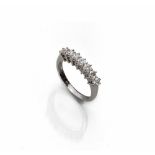 FINE RING RIVIERE in white gold 18 kt., with seven diamonds. Diamond colour G/H, purity VS,