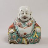 SCULPTURE IN PORCELAIN WITH POLYCHROME ENAMEL, CHINA, 19TH CENTURY depicting Budai. Classical