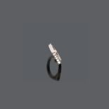 RING in white gold 18 kt., with five diamonds. Diamonds ct. 0.20, overall weight gr. 3,60.