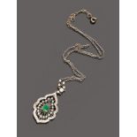 FINE CHOKER NECKLACE in white gold 18 kt., pendant with set emerald and diamond surround. Length cm.