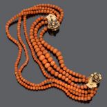 FINE CHOKER NECKLACE three strings of coral, divided by elements in yellow gold with enamels and