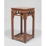 TURRET IN TEAK, CHINA 20TH CENTURY square surface, straight legs and geometric ornamental coils.