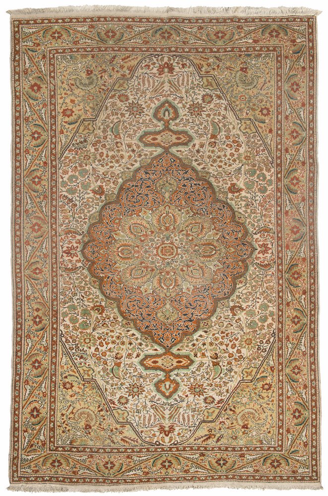 TABRIZ RUG, EARLY 20TH CENTURY large Arabesque central medallion with palmette and secondary