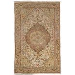 TABRIZ RUG, EARLY 20TH CENTURY large Arabesque central medallion with palmette and secondary