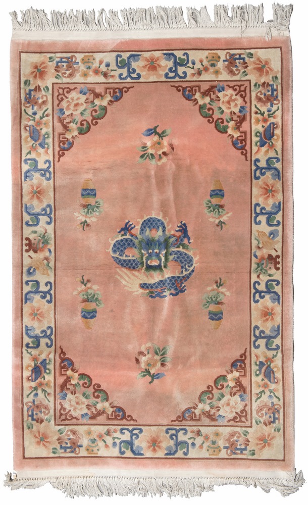 A CINESE CARPET, BEIJING MIDDLE OF 19TH CENTURY cloud and e dragon in the center field on pink