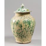 POTIQUE IN TERRACOTTA, SALENTO LATE 19TH CENTURY white and green enamel with patch design. Size