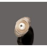 RING in white gold 18 kt., with central pearl. Mount engraved with sunflowers. Weight gr. 7,50.