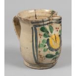 JUG IN MAIOLICA, SOUTHERN ITALY, LATE 18TH CENTURY

cream enamel and polychrome, with pattern of