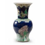 VASE IN FAHUA PORCELAIN, CHINA, FIRST HALF 20TH CENTURY with buddhist lion, elephant, kilin, rocks