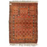 ANTIQUE BELUCISTAN RUG, EARLY 20TH CENTURY

modular design with diamonds, in centre field with red