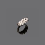 FINE RING in white gold 18 kt., plait shape with diamonds. Diamonds ct. 0.60 ca., weight gr. 10,00.