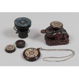 FOUR COMPASSES IN WOOD, ENGRAVED BONE, BRONZE AND STONE, CHINA, 20TH CENTURY various shapes, among