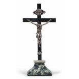 FINE CRUCIFIX IN SILVER, 19TH CENTURY

cross and base in wood as fake green marble.

Size cm. 44,5 x