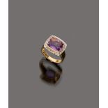 FINE RING

yellow gold 18 kt. rectangular shape, with central amethyst and diamond surround.