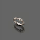 FOPE RING

white gold 18 kt., twisted with centre in diamonds.

Diamonds ct. 0.05 ca., overall