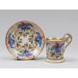 FINE CUP AND SAUCER IN PORCELAIN, 19TH CENTURY

polychrome glazing, with tulips and leaves. Gold