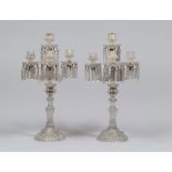 PAIR OF CANDLEHOLDERS IN GLASS AND OPALINE, 20TH CENTURY

four arms, shaft with head of rams. 

Size