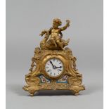 TABLE CLOCK IN ORMOLU, 19TH CENTURY

case chiselled with angle on swan. Plaques in Sevres porcelain.