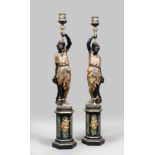 PAIR OF TORCH HOLDER SCULPTURES, PROBABLY VENEZIA, 19TH CENTURY

in black lacquered wood, polychrome