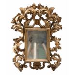 SMALL MIRROR IN GILTWOOD, LATE 18TH CENTURY

carved.

Size cm. 36 x 26 x 5.