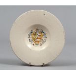 COMPENDIARIO PLATE IN MAJOLICA, CENTRAL ITALY 17TH CENTURY

white glazing, with family crest in
