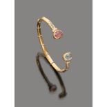 BRACELET

yellow gold 18 kt., with aquamarine and pink topaz and surrounding diamonds.

Diameter cm.