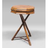 WORK TABLE, IN ELM, 19TH CENTURY

octagonal top, interior in satin upholstery. Three crosses legs in