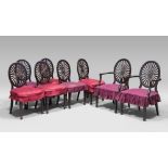 TWO ARM CHAIRS AND SIX SIDE CHAIRS IN EBONY, ENGLAND EARLY 20TH CENTURY

Victorian style, with