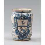 DRUG JAR IN MAJOLICA, CALTAGIRONE 19TH CENTURY

white and blue glazing, with family crest.

Size cm.