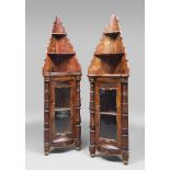 FINE PAIR OF CORNER CUPBOARDS IN FEATHERED MAHOGANY, PROBABLY ENGLAND, 19TH CENTURY

with open upper