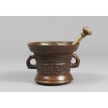 MORTAR AND PESTLE IN BRONZE, NORTHERN ITALY 17TH CENTURY

Inscription on top edge, and dated 1687.