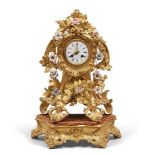 TABLE CLOCK IN GILTWOOD, FRANCE 19TH CENTURY

case carved with leaves and roccailles. Body decorated