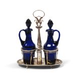 FINE OIL BOTTLES IN SILVER, LOMBARDO VENETO, VENEZIA 1812/1872

in blue glass. Oval tray with