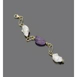 BRACELET

yellow gold 18 kt., with amethysts and natural pearls.

Length cm. 20, overall weight