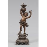 CANDLE HOLDER IN ANTIMONY, 19TH CENTURY

burnished patina, shaft as angel figure. 

h. cm. 48.