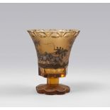 VASE IN GLASS, PROBABLY BOHEMIA 20TH CENTURY

yellow base, decorated with view and carriage. Cut