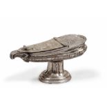 SILVER OIL LAMP, PROBABLY NAPLES 18TH CENTURY

embossed in floral motifs.

Size cm. 16 x 8,5, weight