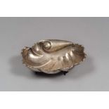 CENTER IN SILVER, 20TH CENTURY

shell-shaped and two feet fish-shaped.

Size cm. 7 x 24 x 18, weight