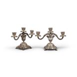 PAIR OF CANDLEHOLDERS IN SILVER, REGNO D'ITALIA, MILANO 1934/1944

floral motifs, three arms.