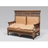 FINE ARAB SOFA, EARLY 20TH CENTURY

in walnut, with inlay in mother of pearl on ebonized base.