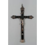 CRUCIFIX IN SILVER, LATE 18TH CENTURY

with cross in black lacquered wood. 

Size croce cm. 79 x