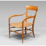 ARMCHAIR IN BEECHWOOD, 1900 ca.
Curved backrest and seats in straw. 
Size cm. 80 x 57 x 59.