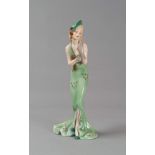 FIGURE OF WOMAN IN CERAMIC, ZACCAGNINI FIRST HALF 20TH CENTURY
green glazing and polychrome,